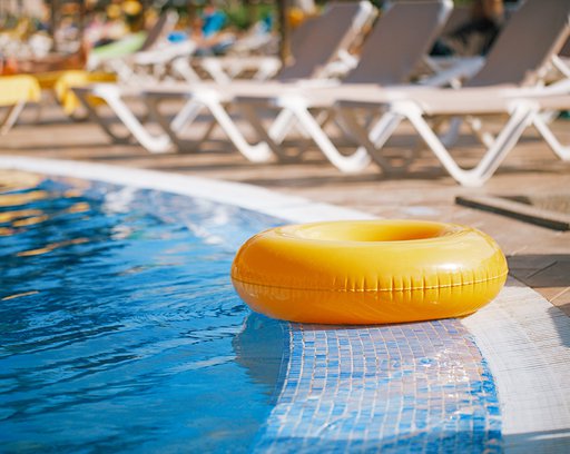floating ring on blue water swim pool