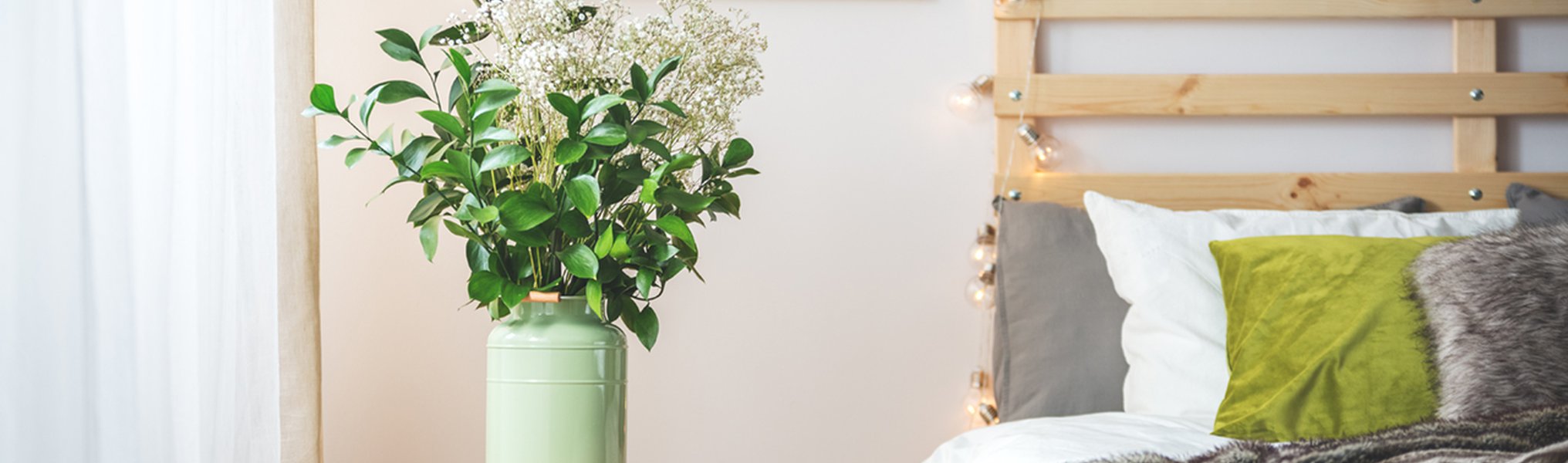 Flowers next to bed